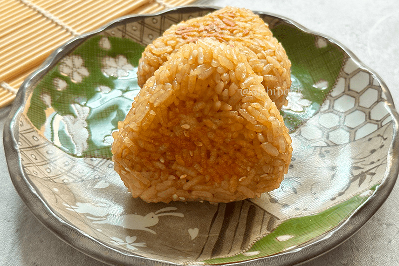 grilled rice balls with soy sauce and sesame